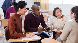 A group of teachers having a meeting