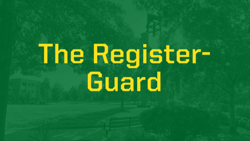 Banner with a green overlay over an image of UO Portland campus and the words "The Register-Guard" in yellow text